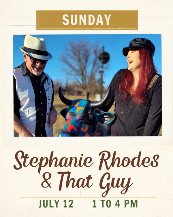 A woman and a man looking at each other laughing